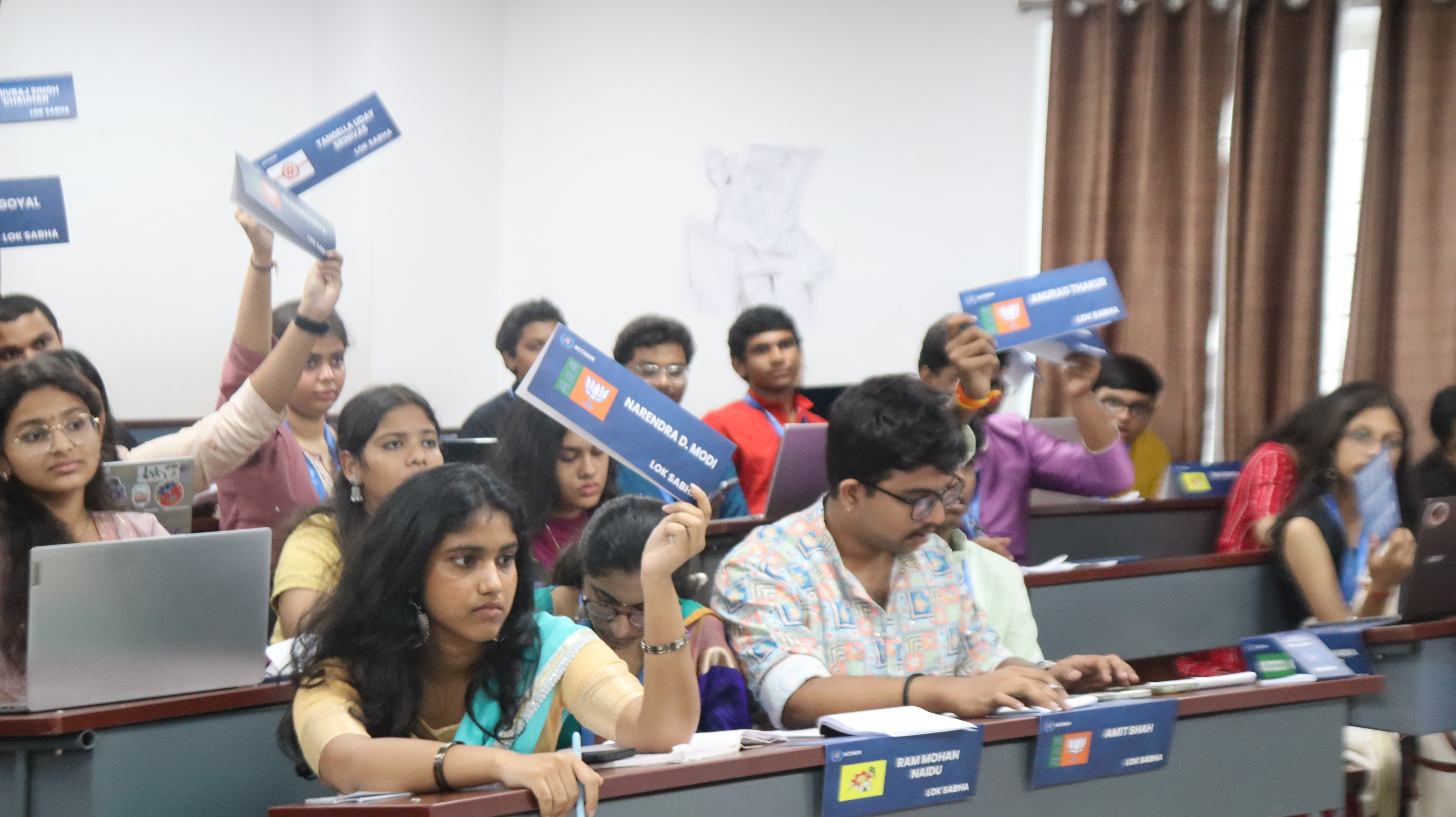 ACCMUN 4.0 delegates raising placards